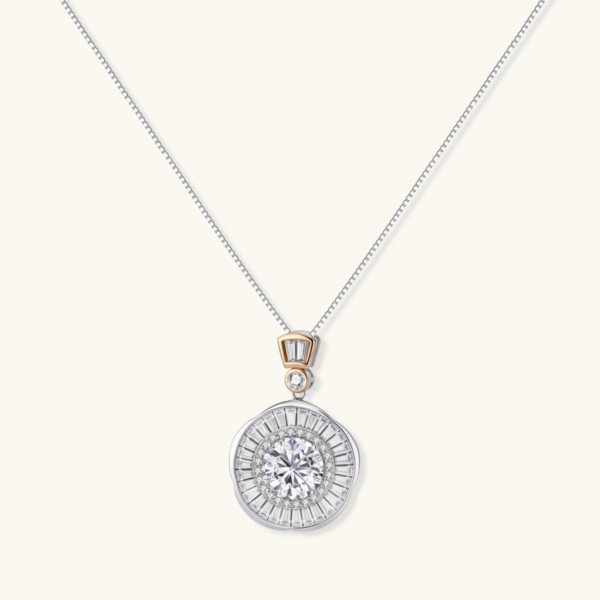 Sterling silver necklace with circular geometric pendant featuring central moissanite and radial baguette pattern.