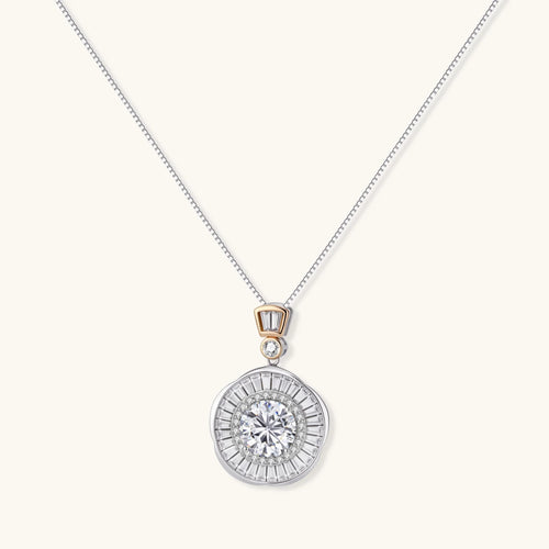 Sterling silver necklace with circular geometric pendant featuring central moissanite and radial baguette pattern.