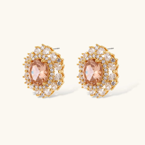 Ornate gold-plated jewelry set featuring peach center stone surrounded by clear AAA cubic zirconia crystals