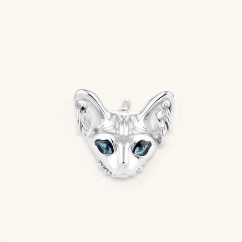 3D sculpted stainless steel Sphynx cat head stud earring with blue CZ eyes and hoop ear details, silver finish.