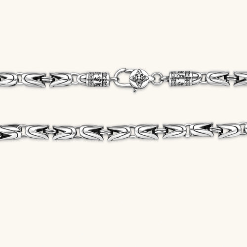 Men's antique silver Byzantine chain necklace, 6.2mm wide interlocking S-link pattern with ornate lobster clasp, 560mm length.