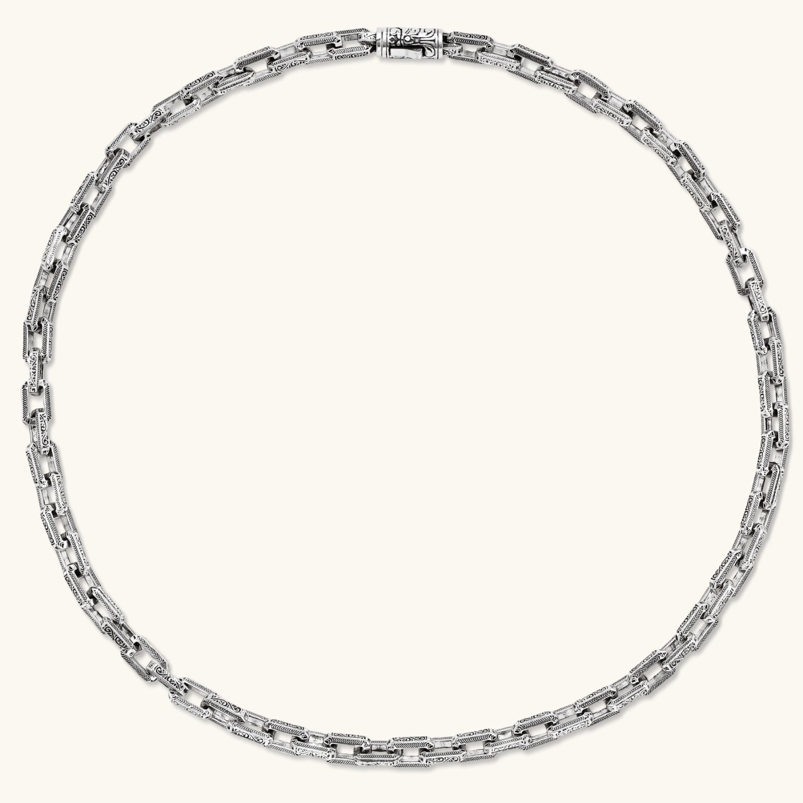 Silver 316L stainless steel rectangular link chain necklace with intricate scroll engravings, 560mm length, 7.1mm width.