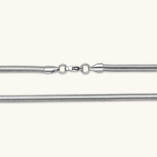 Two-tone twisted necklace with interlocked gold and silver ribbed snake chains, 6mm wide, on a white background.