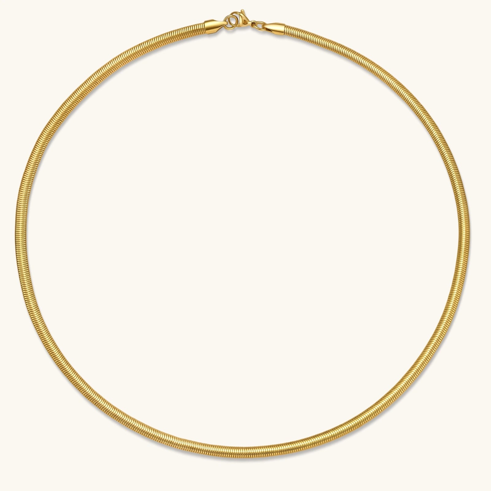 Two-tone twisted necklace with interlocked gold and silver ribbed snake chains, 6mm wide, on a white background.
