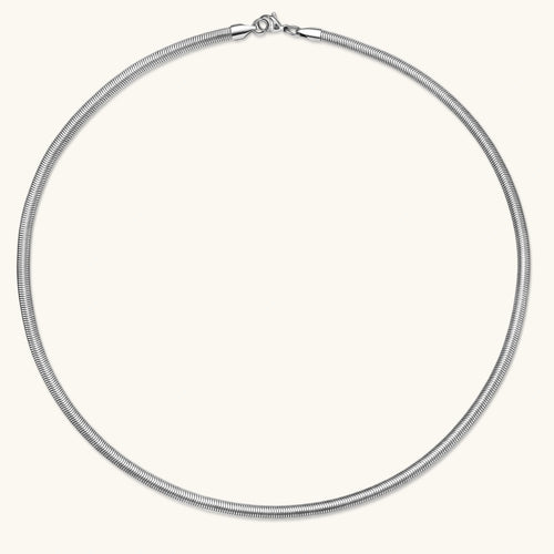Two-tone twisted necklace with interlocked gold and silver ribbed snake chains, 6mm wide, on a white background.